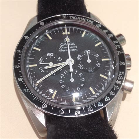 omega watch that went to mon|watches worn by nasa astronauts.